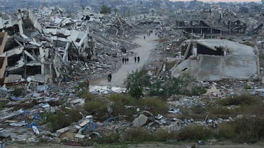 The grandfather and his grandchildren are living in destitution in Gaza. AFP
