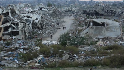 The grandfather and his grandchildren are living in destitution in Gaza. AFP