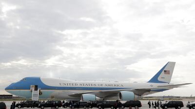 A convoy gather around Air Force One after it landed on July 13, 2017 at Paris' Orly airport with US President Donald Trump and First lady Melania onboard, at the beginning a 24-hour trip that coincides with France's national day and the 100th anniversary of US involvement in World War I. Thomas Samson / AFP
