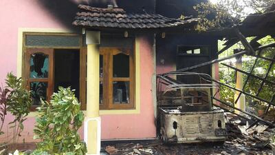 One of the houses burnt during racial violence near Galle on Saturday that started after a traffic accident the day before