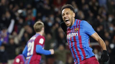 Pierre-Emerick Aubameyang celebrates Pedri's goal against Sevilla. EPA