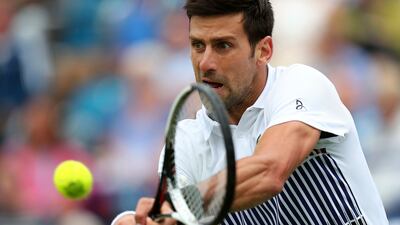 Serbia's Novak Djokovic plays a return to Canada's Vasek Pospisil during their quarterfinal match on day five of the AEGON International tennis tournament at Devonshire Park, Eastbourne, England, Wednesday June 28, 2017. (Gareth Fuller/PA via AP)