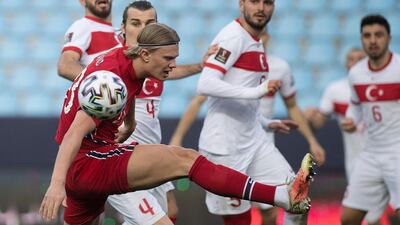 Norway's forward Erling Braut Haaland misses the ball against Turkey. AFP