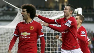Marouanne Fellaini of Manchester United celebrates scoring against West Bromwich Albion for United's opening goal in a 2-2 draw in the Premier League on Monday night. Stefan Wermuth / Reuters