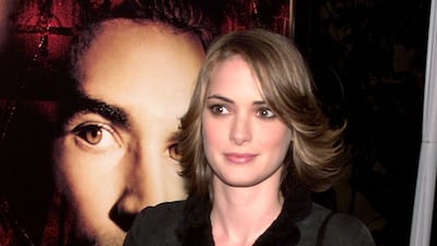Winona Ryder in a black jacket with silver clutch at the premiere of 'Lost Souls' at the Egyptian Theatre in Los Angeles, California, on November 10, 2000. Getty