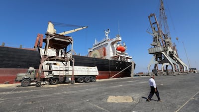 A ship unloads grain in Hodeidah, Yemen's main port for food and aid shipments. Reuters