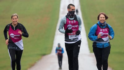 Britain's Sophie, Countess of Wessex and Patron of Mencap, joins Tomas Cardillo-Zallo, a member of Mencap's Learning Disability Running team, with his mum Sue acting as his guide runner, for the first 1.5 miles of his virtual London Marathon. Reuters