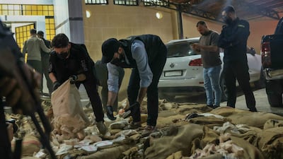 Security forces display about 12 million captagon pills after a drug bust in Damascus. Drug smuggling from Syria into Lebanon is a thorny issue with Lebanon.