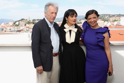 Ben Hania, right, with Greek filmmaker Costa-Gavras and Mexican actress Salma Hayek at the Cannes Film Festival in 2017. Getty Images