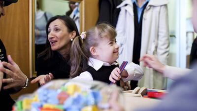 Selena Bajraktarevic, Health and ECD Specialist for Unicef, and Nejra Zukan, 6, at the Resource Room during a field trip visit to the Donje Rosulje Kindergarten School. Dubai Cares has partnered with Unicef to formulate childhood preschool development programmes for vulnerable children in Bosnia and Herzegovina. Razan Alzayani / The National
