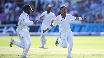 Yasir Shah, right, took 10 wickets against Pakistan on Sunday. Gareth Copley / Getty Images