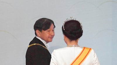 Japan's new Emperor Naruhito, accompanied by new Empress Masako, leaves after making his first address during a ritual after succeeding his father Akihito at Imperial Palace in Tokyo. AP