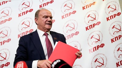 Russian Communist Party leader Gennady Zyuganov leaves a news conference. AP