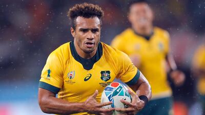 Australia's Will Genia runs in to score a try. AP