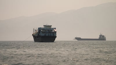 Vessels are anchored near the Strait of Hormuz. Oil and gas container traffic has increased since the US and Iran secured a deal. Reuters