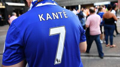 A Chelsea fan wears the shirt of N’Golo Kante prior to the Premier League match between Chelsea and West Ham United at Stamford Bridge on August 15, 2016 in London, England. Michael Regan / Getty Images
