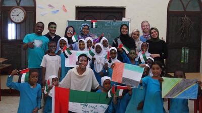 Spreading Grace members at the charity school with the children to whom they gave reading classes and a lesson in giving. Courtesy Shadiah Abdullah Al Jabry