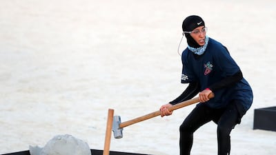 A member of the DEWA team tries to hammer home an advantage.