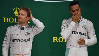 Mercedes-GP teammates Nico Rosberg, left, and Lewis Hamilton on the podium. Nelson Almeida / AFP