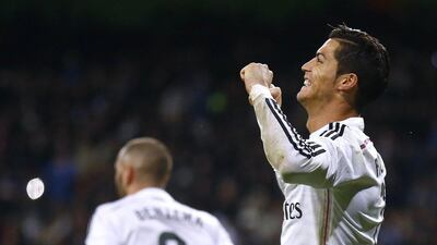 Real Madrid's Cristiano Ronaldo celebrates scoring against Celta Vigo in his team's La Liga win on Saturday at the Santiago Bernabeu. Andrea Comas / Reuters