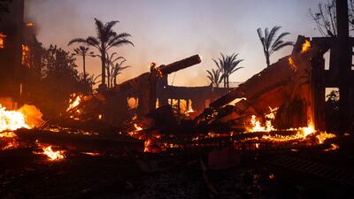 A house is reduced to rubble in Laguna Niguel. EPA