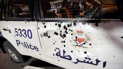 Sharpnel from a blast in the village of Diraz, Bahrain, perforated a police vehicle. The explosion killed one and injured two others. Hamad I Mohammed / Reuters