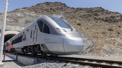 The first train sets off from Fujairah on its way to Abu Dhabi at 5.34am. Antonie Robertson / The National