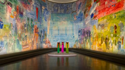 A 1937 Raoul Dufy painting encircles YSL ensembles from the 1990s, on display at Musee d'Art Moderne. Photo: Nicolas Matheus