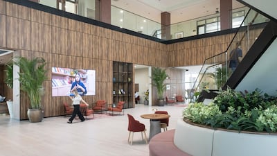 The modern and spacious lobby area of the new school