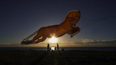 A horse shaped kite named Goldey takes to the sky at Crosby beach in England. Christopher Furlong / Getty Images