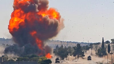 A fireball erupts at the site of an explosion that hit a joint Turkish-Russian patrol on the strategic M4 motorway, near the Syrian town of Ariha in rebel-held Idlib province. AFP