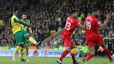 Sebastien Bassong shoots and scores the 4-4 equaliser for Norwich City in added time on Saturday. Alex Morton / Action Images / Reuters
