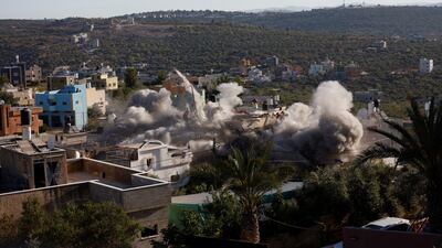 Israeli forces blow up the house of alleged Palestinian militant Yahya Mari, in Qarawat Bani Hassan in the occupied West Bank. Reuters