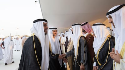 Sheikh Diab bin Mohamed bin Zayed, greets guests, including HH Sheikh Saeed bin Zayed, the chairman of Al Wahda Football Club, right, during his wedding reception. Ryan Carter / Crown Prince Court - Abu Dhabi