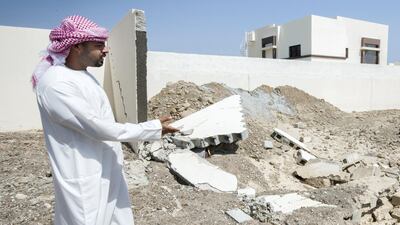 Jasim Al Abdouli says flood water brought debris and rocks into the village