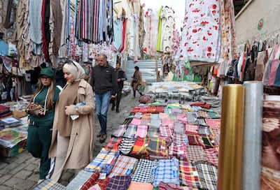 People shop at a market of the old town Casbah in Algiers. Emirates flies daily to the capital city of Algeria. EPA