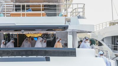 Sheikh Mohammed bin Rashid, Vice President and Ruler of Dubai, tours a yacht at the Dubai International Boat Show.