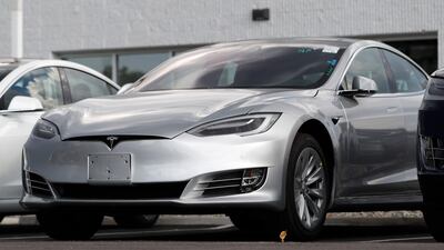 A Tesla Model 3 car rammed into an overturned lorry on May 5, killing the driver and seriously injuring one person. AP