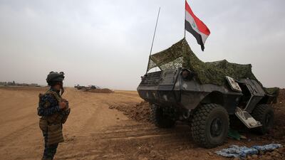 Iraqi forces gather at their camp on the front line in the northwestern town of Faysh Khabur, near the borders with Syria and Turkey, on October 28, 2017. Ahmad Al Rubaye / AFP