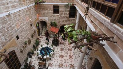 Palestinian university professor Atef Salama in his house, a 430-year-old Levantine-style palace, on February 6, 2016, in Gaza City. Mahmud Hams/AFP