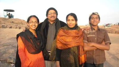 Dona and her brother, far right, were born in Yemen, where their mother worked as nurse for 20 years. The family is seen here near near the Rock Palace in Wadi Dhar, Yemen. Dona Cheriyan / The National