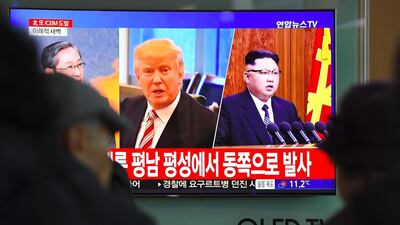 At odds: US President Donald Trump and the man he dubbed "litle Rocket man" - North Korean leader Kim Jong-Un who fired another intercontinental ballistic missile after the US slapped fresh sanctions on Pyongyang Jung Yeon-Je / AFP