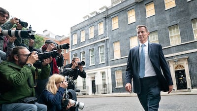 Jeremy Hunt leaves 10 Downing Street in London after he was appointed Chancellor of the Exchequer following the resignation of Kwasi Kwarteng. Here 'The National' looks back through Mr Hunt's political career. PA
