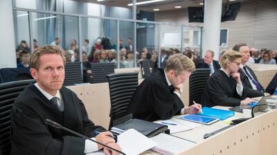 Norway’s attorney-general Fredrik Sejersted (L) before the start of a trial where the Norwegian government was being sued by climate activists. AFP.