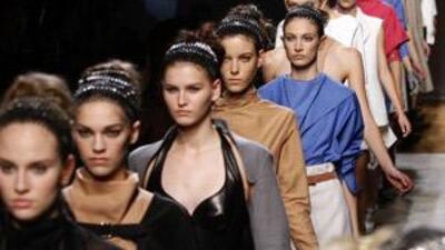 The Italian designer Stefano Pilati presented a collection for Yves Saint Laurent full of contrast detailing and some unexpected colours.