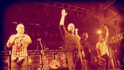 From left, Pixies' Joey Santiago, Black Francis, Paz Lenchantin and David Lovering. Jason Kempin / Getty Images for Coachella / AFP