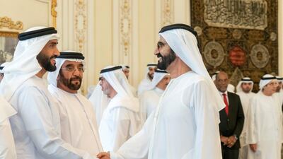 Sheikh Nahyan Bin Zayed Al Nahyan, chairman of the board of trustees of Zayed bin Sultan Al Nahyan Charitable and Humanitarian Foundation,left, greets Sheikh Mohammed bin Rashid. Seen with Sheikh Saif bin Mohamed Al Nahyan, centre.