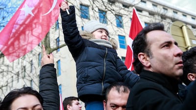 People from Turkish communities welcome Turkish President Erdogan ahead of a meeting and a press conference with NATO Secretary General Jens Stoltenberg in Brussels. EPA
