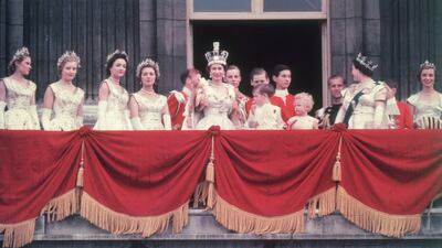 The queen at Buckingham Palace after her coronation ceremony. Getty