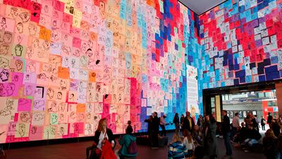 The Royally Big Portrait, which features thousands of pictures of King Charles drawn by children, is launched in London. Getty